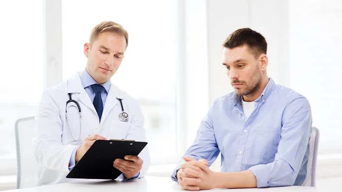 image of a person consulting a physician